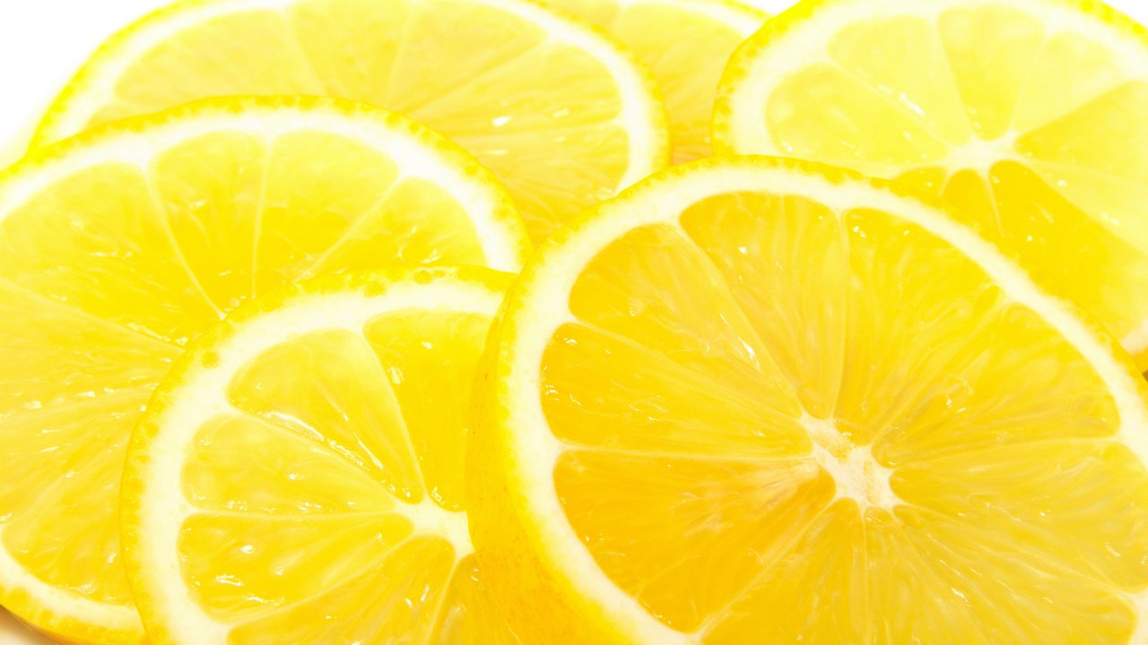 Обои желтый, фрукты, фотографии, цитрус, плоды, макро обои, лимоны, yellow, fruit, photos, citrus, macro wallpaper, lemons разрешение 1920x1200 Загрузить