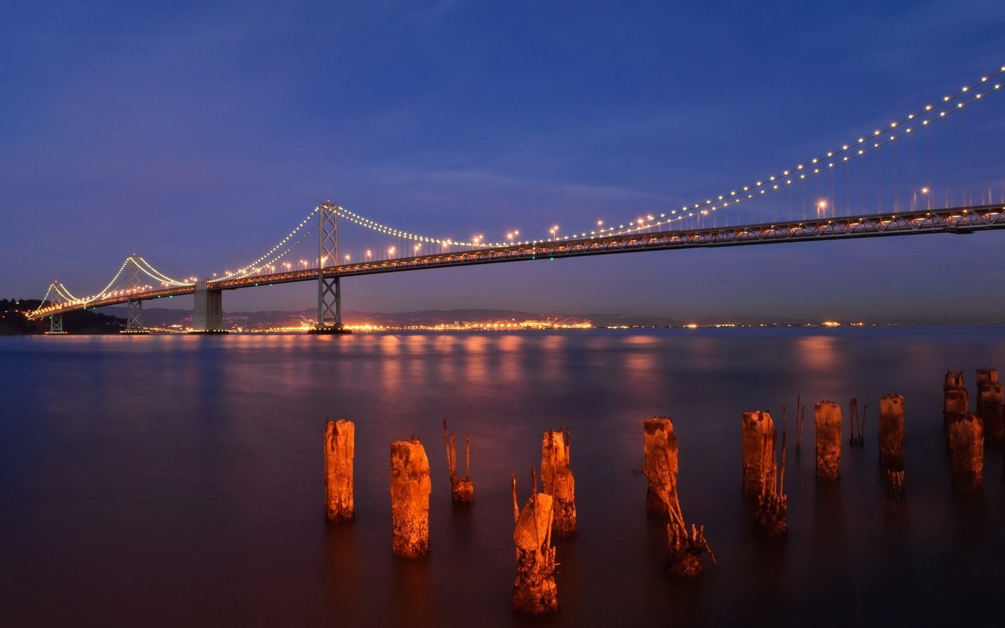 Обои ночь, огни, вода, панорама, мост, сан-франциско, bay bridge, бэй бридж, night, lights, water, panorama, bridge, san francisco разрешение 1920x1200 Загрузить