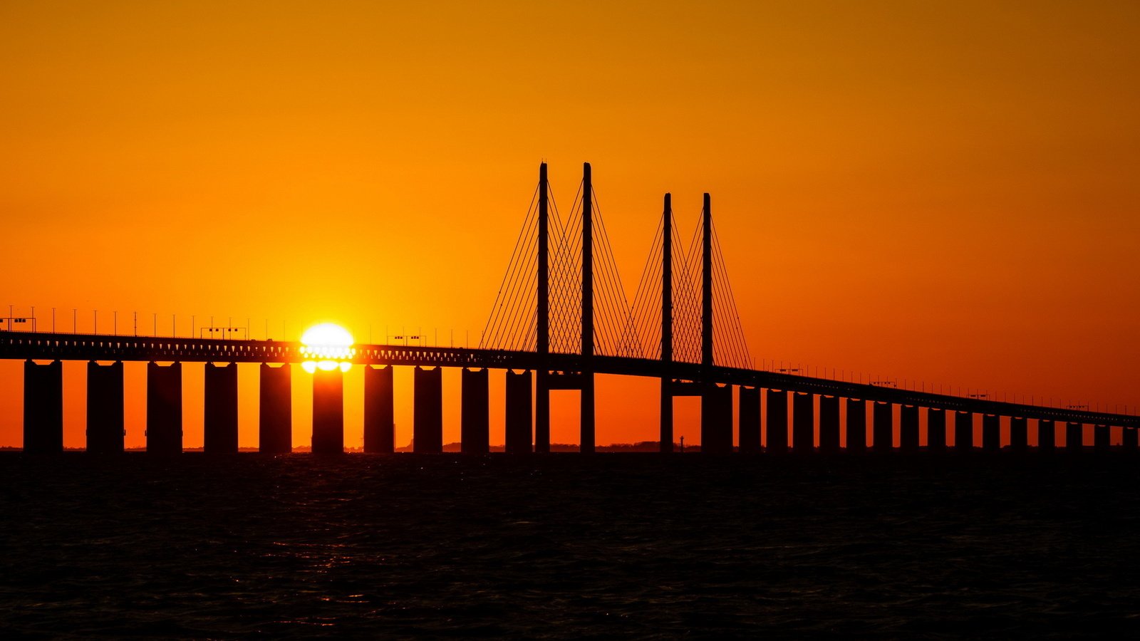 Обои закат, мост, дания, эресуннский, sunset, bridge, denmark, öresund разрешение 1920x1200 Загрузить