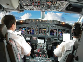 Обои небо, облака, самолет, кабина, пилоты, приборы, the sky, clouds, the plane, cabin, pilots, devices разрешение 1920x1200 Загрузить