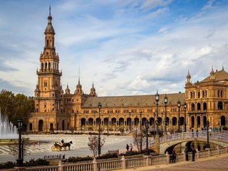 Обои деревья, plaza de españa, sevilla, фонари, мост, канал, фонтан, дворец, испания, площадь, trees, lights, bridge, channel, fountain, palace, spain, area разрешение 3000x1915 Загрузить