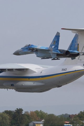 Обои самолет, ввс, украина, су-27, военно-транспортный, ил-76мд, the plane, bbc, ukraine, su-27, military transport, il-76md разрешение 2112x1188 Загрузить