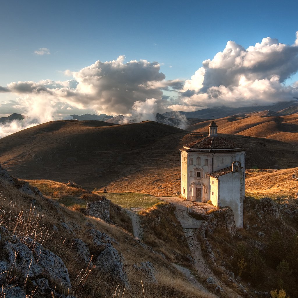 Обои небо, облака, горы, холмы, природа, камни, кусты, церковь, the sky, clouds, mountains, hills, nature, stones, the bushes, church разрешение 2560x1600 Загрузить