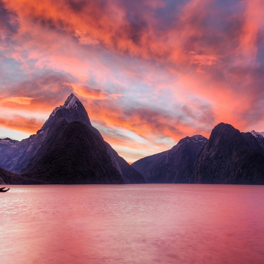 Обои небо, облака, озеро, горы, закат, новая зеландия, милфорд саунд, sunset in milford sound, trey ratcliff, the sky, clouds, lake, mountains, sunset, new zealand, milford sound разрешение 1920x1129 Загрузить