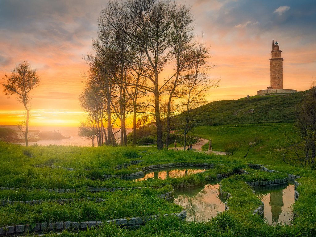 Обои трава, вода, природа, пейзаж, утро, маяк, рассвет, свет солнечный, grass, water, nature, landscape, morning, lighthouse, dawn, light solar разрешение 1920x1200 Загрузить