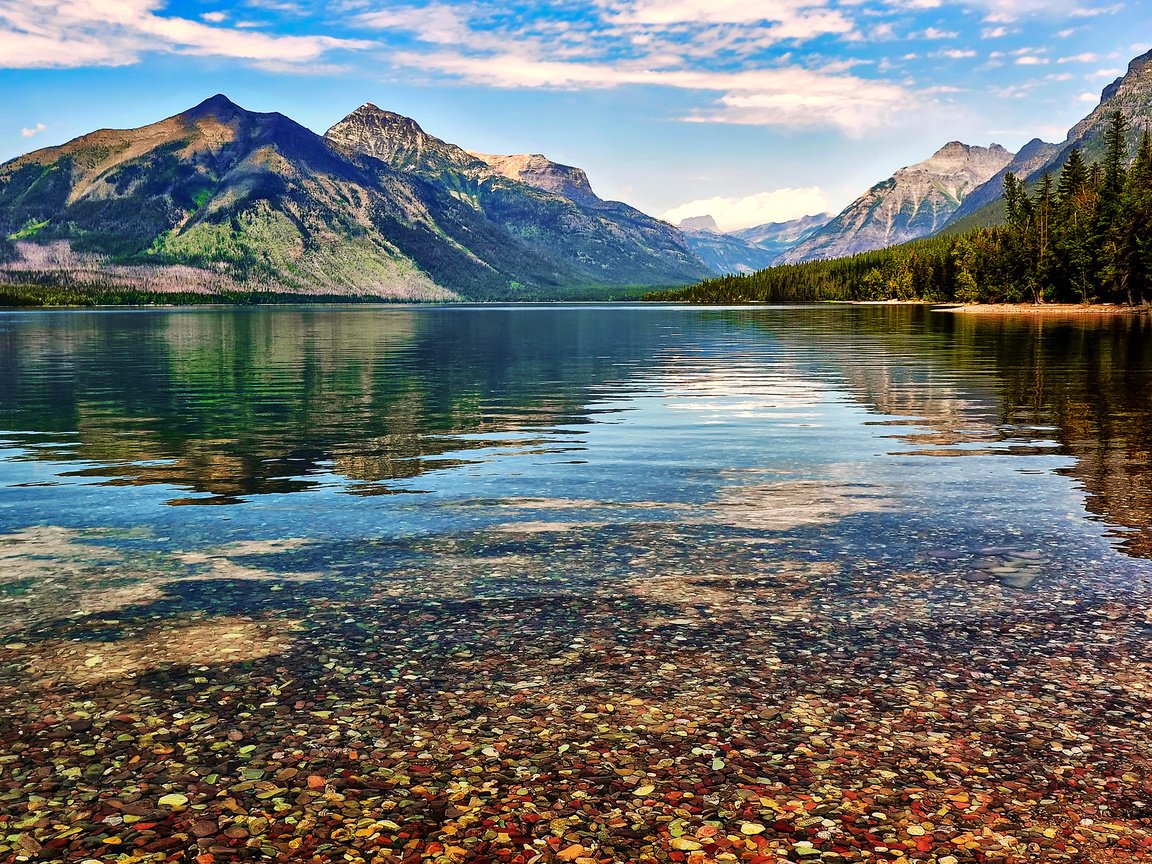 Обои небо, озеро, горы, камни, сша, штат монтана, озеро макдональд, mcdonald lake, the sky, lake, mountains, stones, usa, montana разрешение 2048x1235 Загрузить