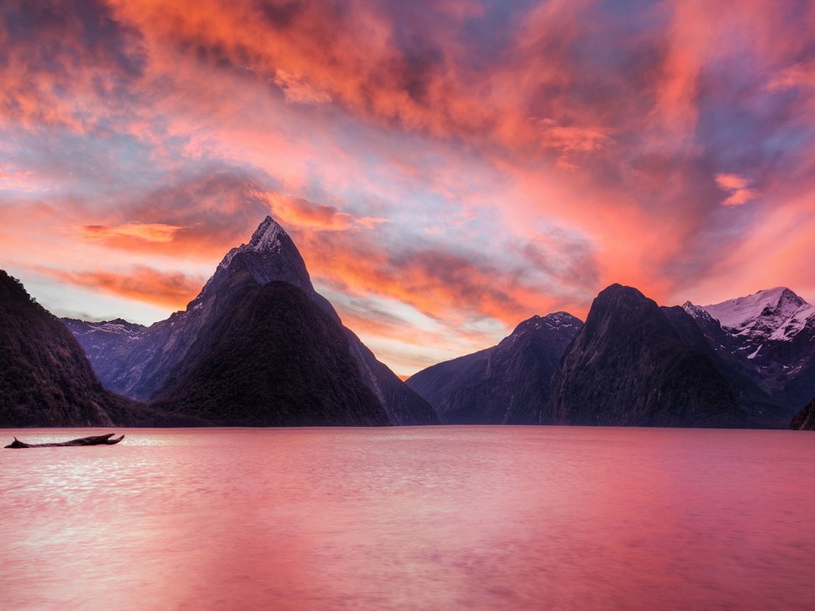 Обои небо, облака, озеро, горы, закат, новая зеландия, милфорд саунд, sunset in milford sound, trey ratcliff, the sky, clouds, lake, mountains, sunset, new zealand, milford sound разрешение 1920x1129 Загрузить