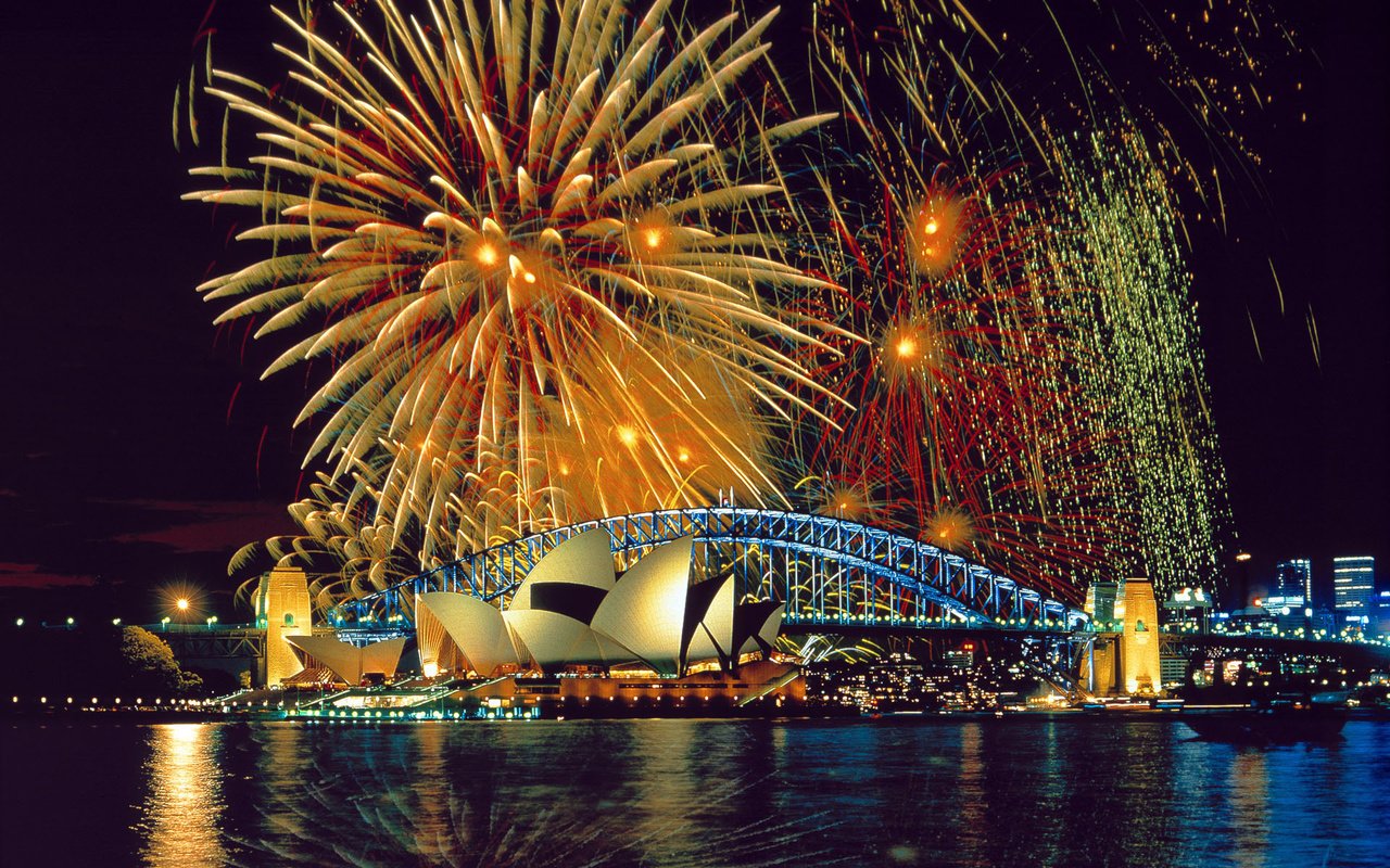 Обои ночь, новый год, море, мост, сидней, австралия, фейерверк, сиднейский оперный театр, night, new year, sea, bridge, sydney, australia, fireworks, sydney opera house разрешение 1920x1200 Загрузить