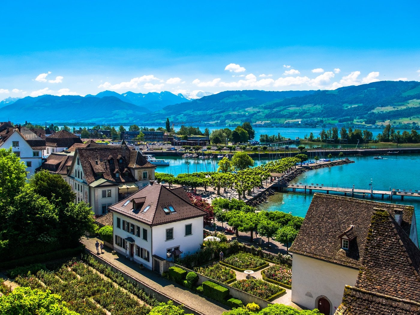 Обои озеро, горы, берег, швейцария, дома, солнечно, rapperswil, lake, mountains, shore, switzerland, home, sunny разрешение 3640x2420 Загрузить