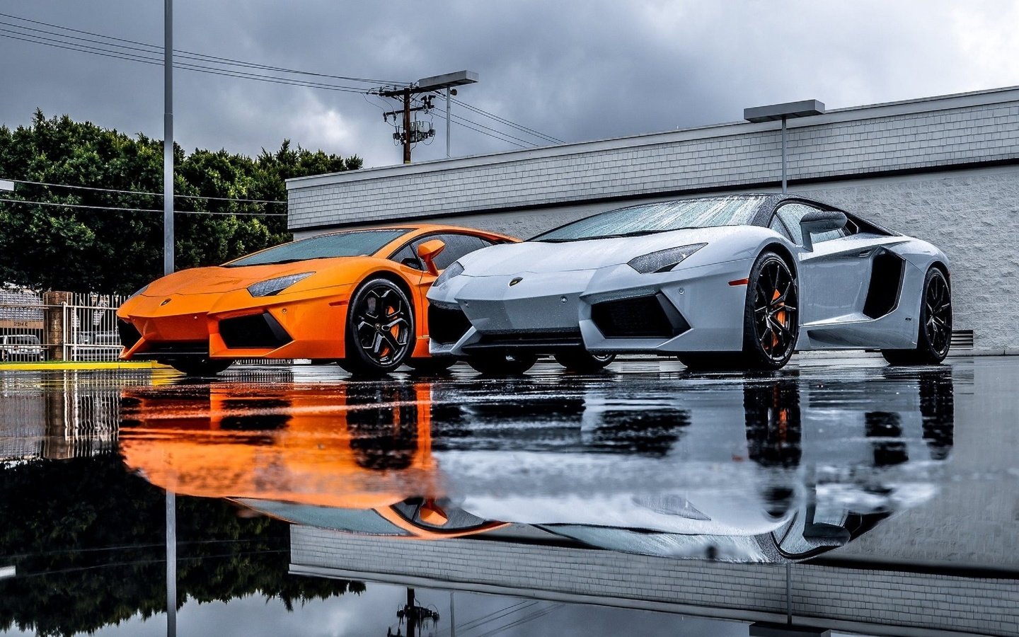 Обои серый, дождь, оранжевый, ламборгини, суперкар, авентадор, grey, rain, orange, lamborghini, supercar, aventador разрешение 2560x1600 Загрузить