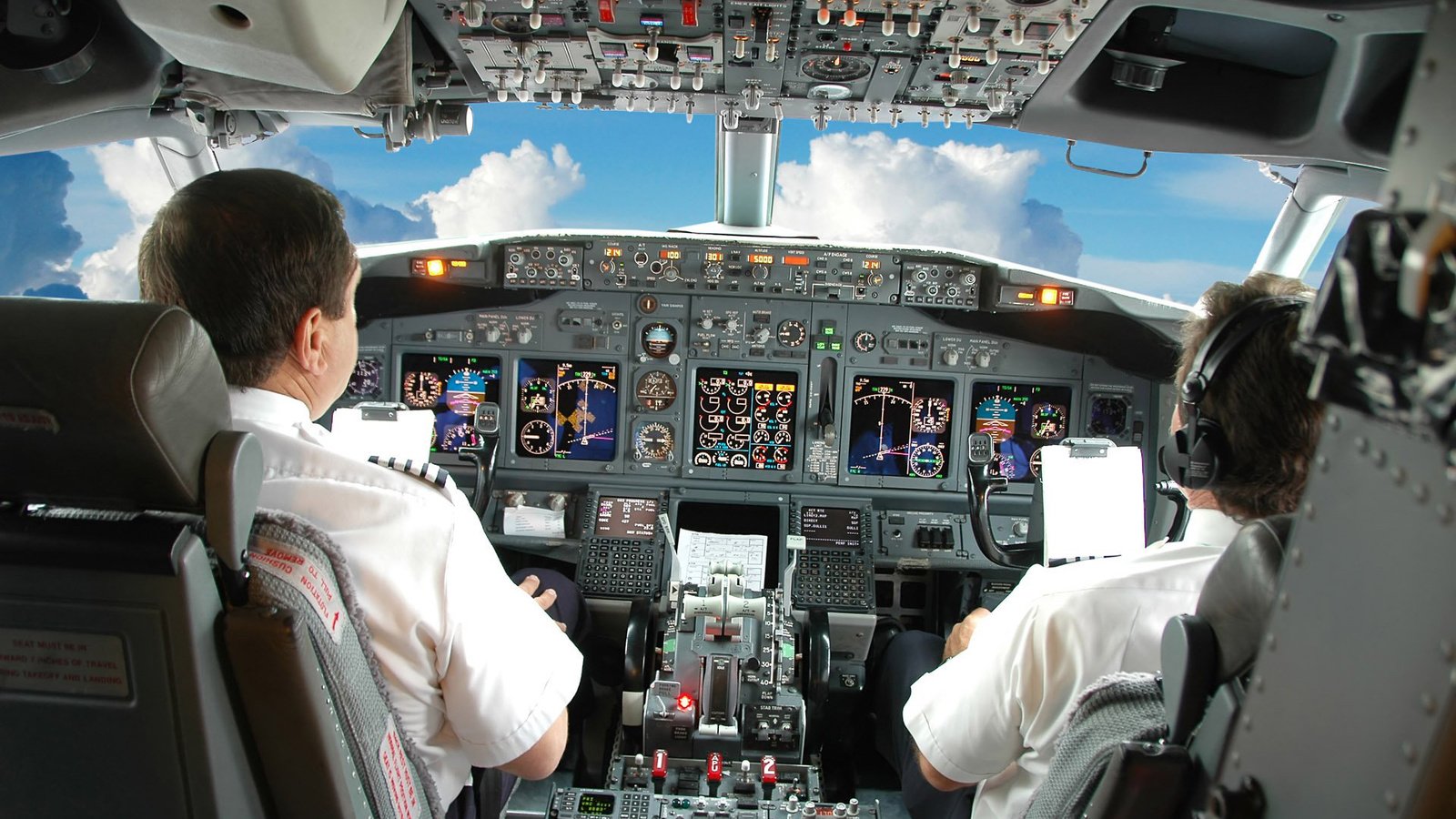 Обои небо, облака, самолет, кабина, пилоты, приборы, the sky, clouds, the plane, cabin, pilots, devices разрешение 1920x1200 Загрузить