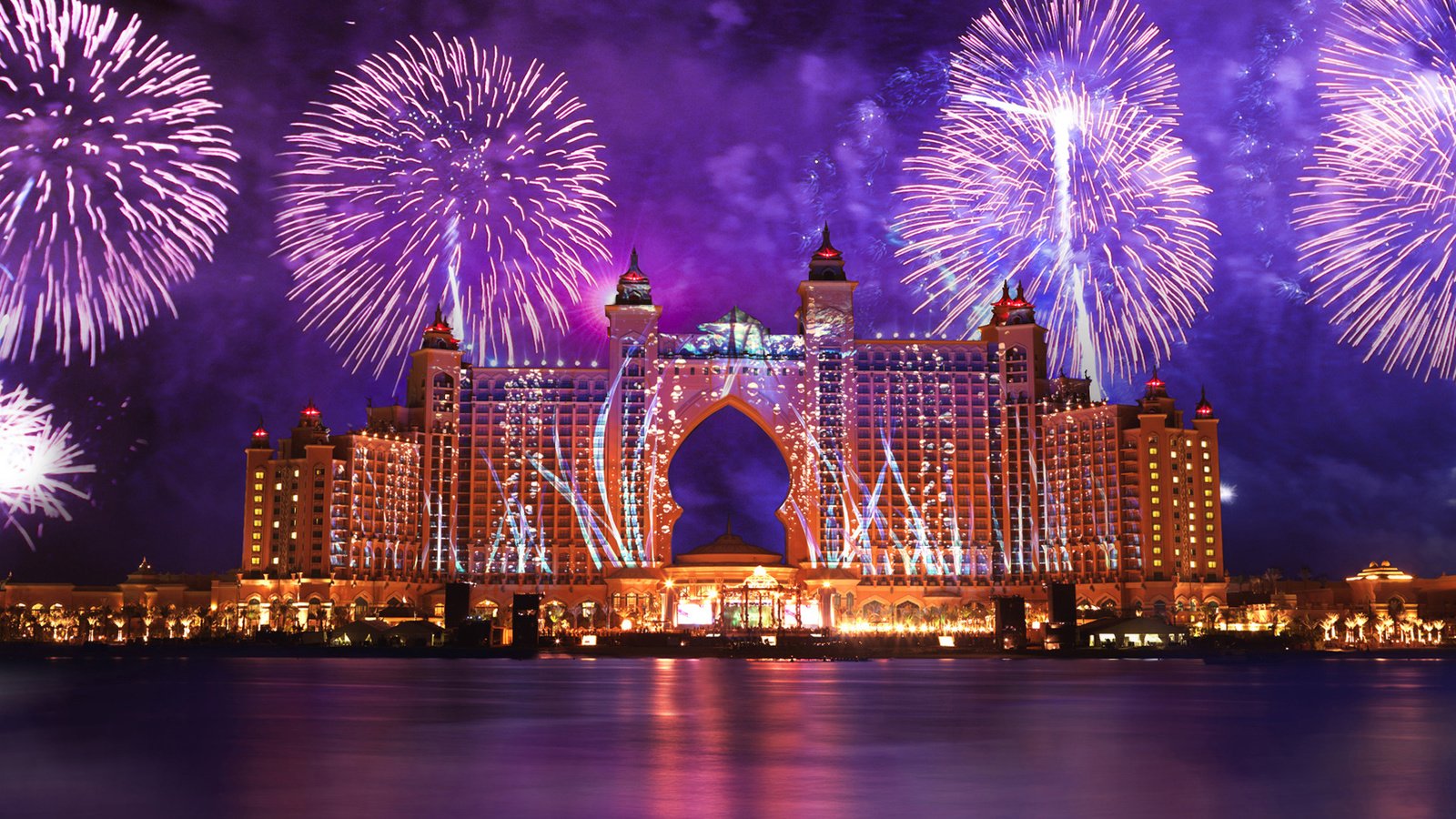 Обои огни, вода, фейерверк, отель, дубай, оаэ, lights, water, fireworks, the hotel, dubai, uae разрешение 1920x1200 Загрузить