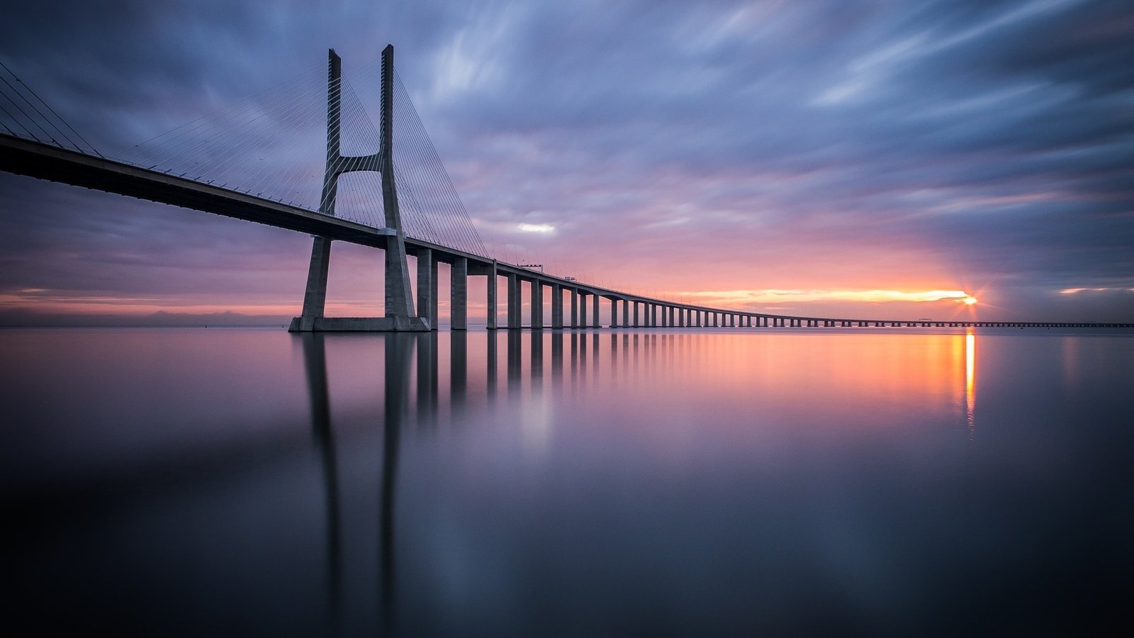 Обои небо, мост, португалия, лиссабон, вантовый мост, vasco da gama bridge, мост васко да гама, the sky, bridge, portugal, lisbon, cable-stayed bridge, bridge vasco da gama разрешение 2048x1366 Загрузить