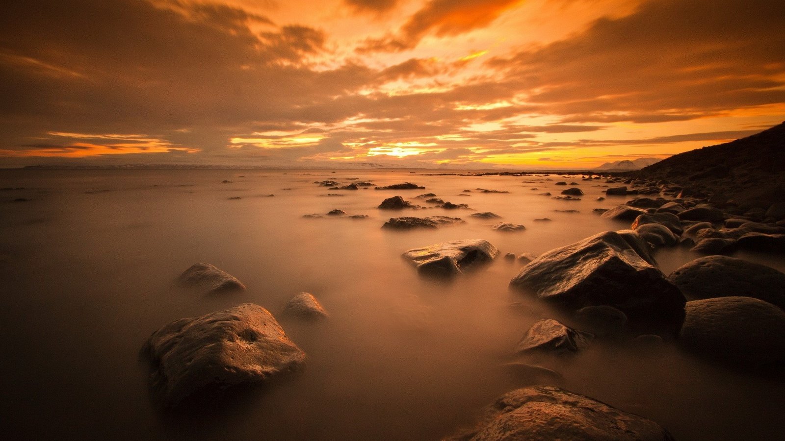 Обои небо, облака, камни, закат, море, горизонт, the sky, clouds, stones, sunset, sea, horizon разрешение 1920x1200 Загрузить