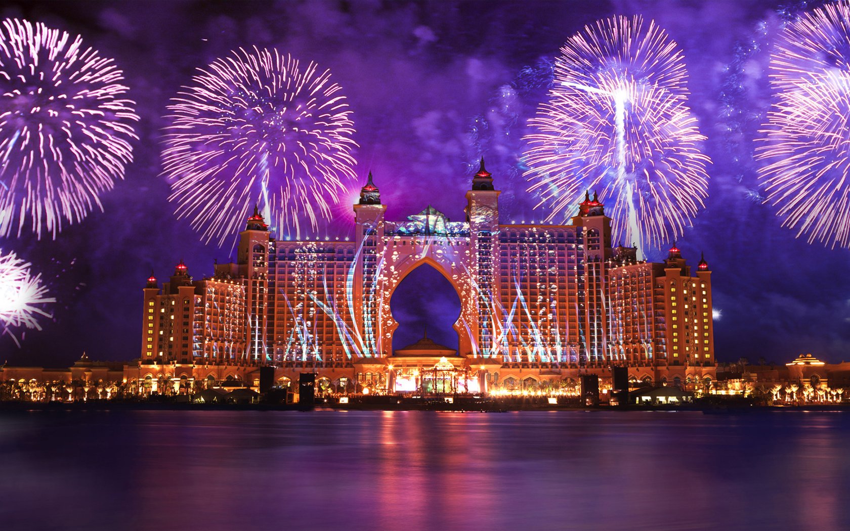 Обои огни, вода, фейерверк, отель, дубай, оаэ, lights, water, fireworks, the hotel, dubai, uae разрешение 1920x1200 Загрузить