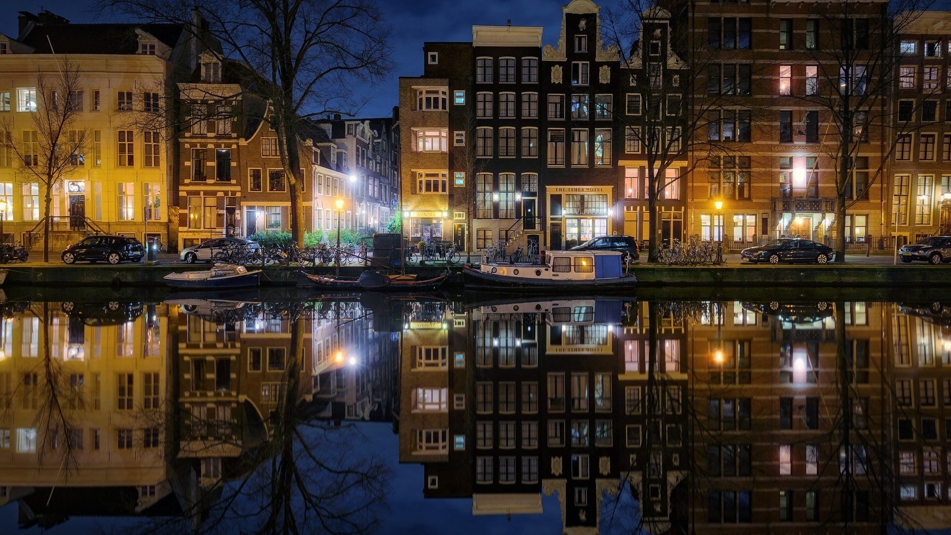 Обои ночь, огни, отражение, город, нидерланды, амстердам, night, lights, reflection, the city, netherlands, amsterdam разрешение 1920x1200 Загрузить
