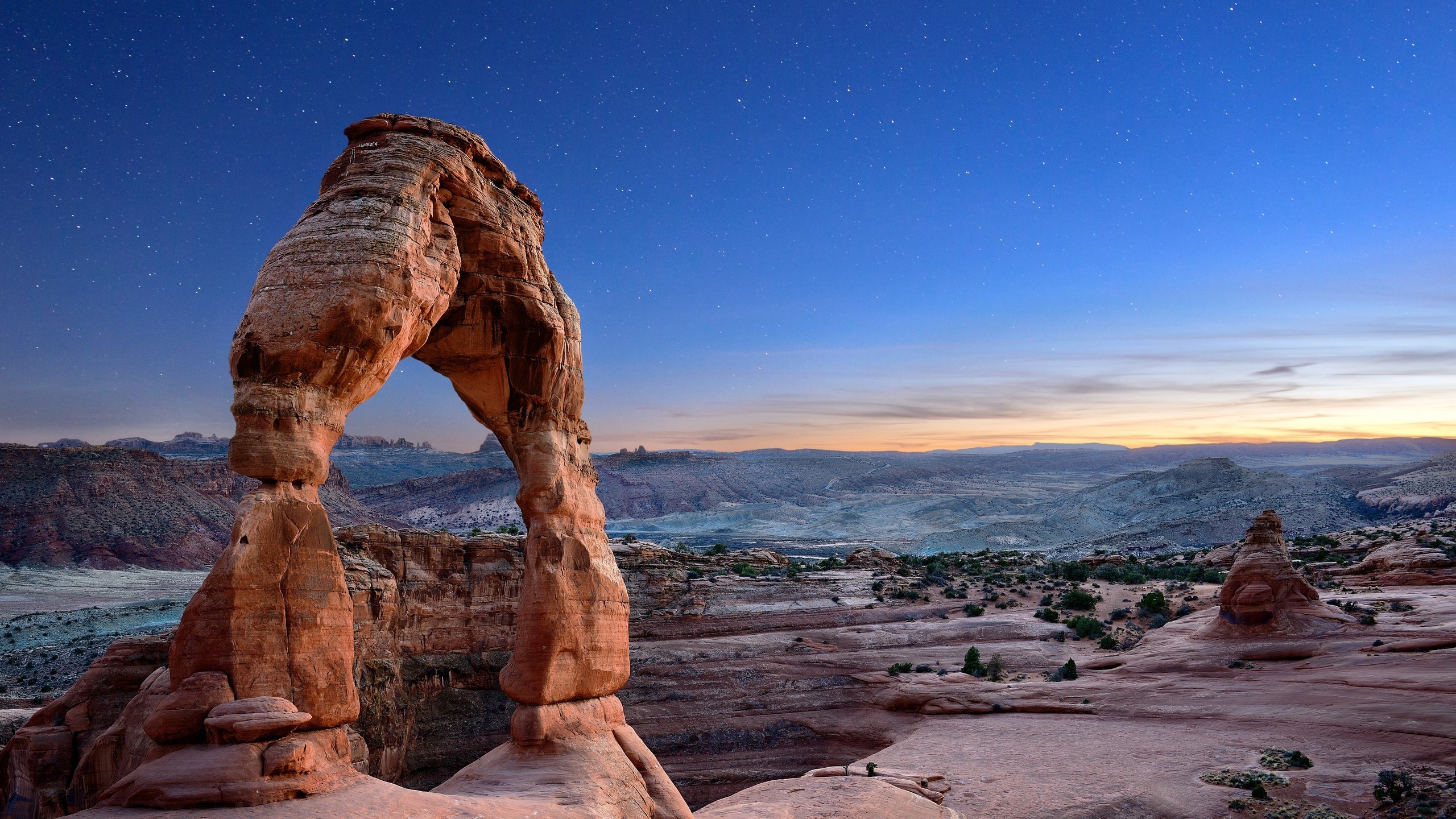 Обои небо, арка, камни, национальный парк арки, закат, delicate arch, звезды, горизонт, каньон, сша, юта, the sky, arch, stones, arches national park, sunset, stars, horizon, canyon, usa, utah разрешение 6016x4016 Загрузить