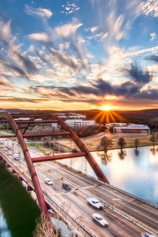 Обои река, солнце, мост, город, сша, техас, остин, pennybacker bridge, river, the sun, bridge, the city, usa, texas, austin разрешение 2560x1600 Загрузить