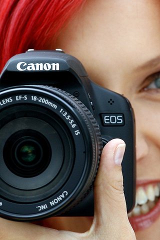 Обои фокус камеры, девушка, фотоаппарат, объектив, красные волосы, канон, the focus of the camera, girl, the camera, lens, red hair, canon разрешение 1920x1200 Загрузить