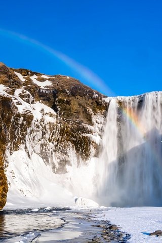 Обои горы, скалы, снег, зима, водопад, радуга, mountains, rocks, snow, winter, waterfall, rainbow разрешение 1920x1229 Загрузить