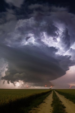 Обои небо, дорога, ночь, природа, молния, поле, гроза, циклон, the sky, road, night, nature, lightning, field, the storm, cyclone разрешение 1920x1080 Загрузить