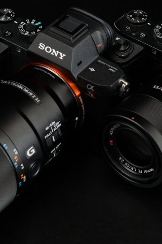 Обои фотоаппарат, черный фон, камера, объектив, сони, alpha, the camera, black background, camera, lens, sony разрешение 5514x3569 Загрузить