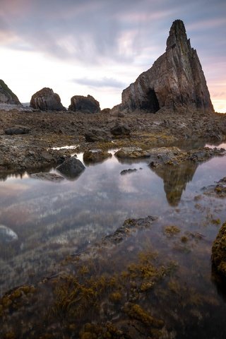 Обои небо, вечер, скалы, камни, берег, отражение, море, the sky, the evening, rocks, stones, shore, reflection, sea разрешение 3840x2160 Загрузить