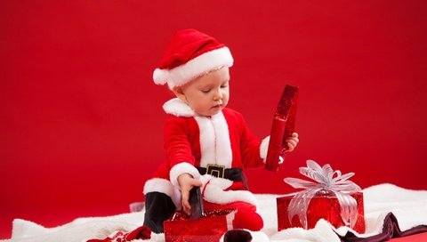 Обои новый год, бант, подарки, ребенок, мальчик, костюм, рождество, мех, санта клаус, new year, bow, gifts, child, boy, costume, christmas, fur, santa claus разрешение 2880x1920 Загрузить
