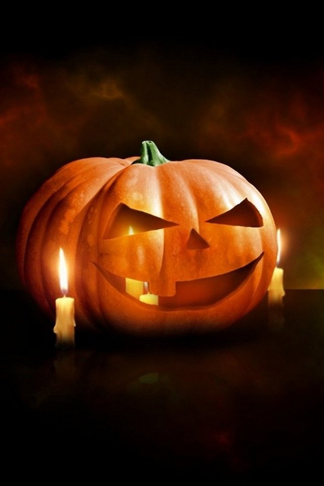 Обои тыква и горящие свечи, pumpkin and burning candles разрешение 2560x1440 Загрузить