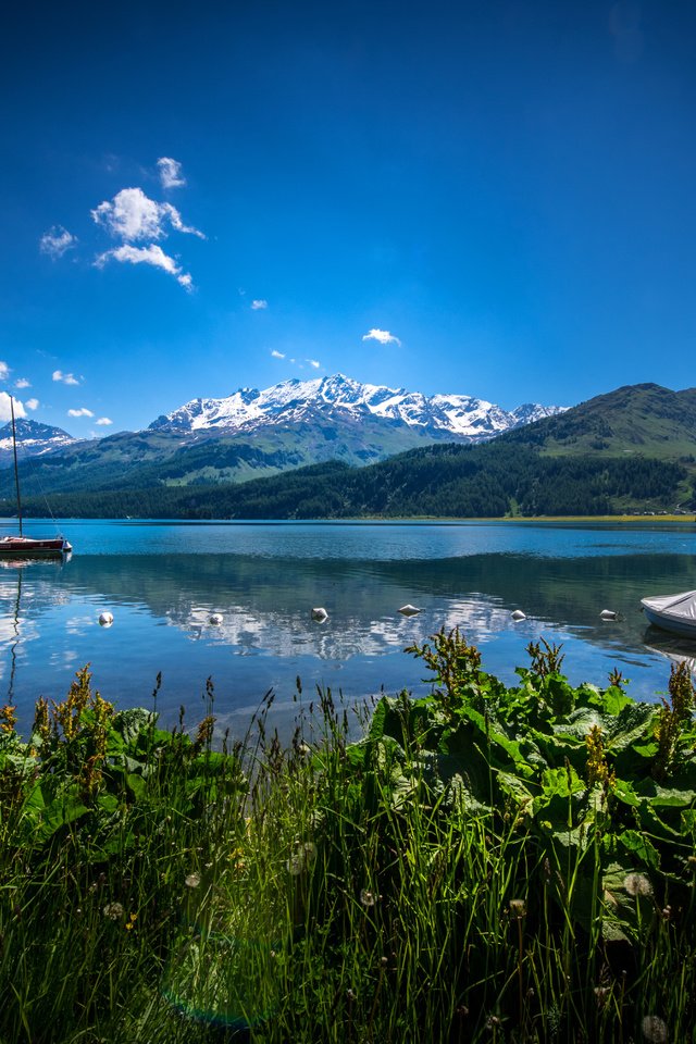 Обои небо, облака, озеро, горы, швейцария, лодки, альпы, the sky, clouds, lake, mountains, switzerland, boats, alps разрешение 6016x4016 Загрузить