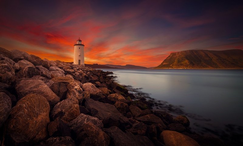 Обои камни, берег, маяк, зарево, stones, shore, lighthouse, glow разрешение 3840x2160 Загрузить