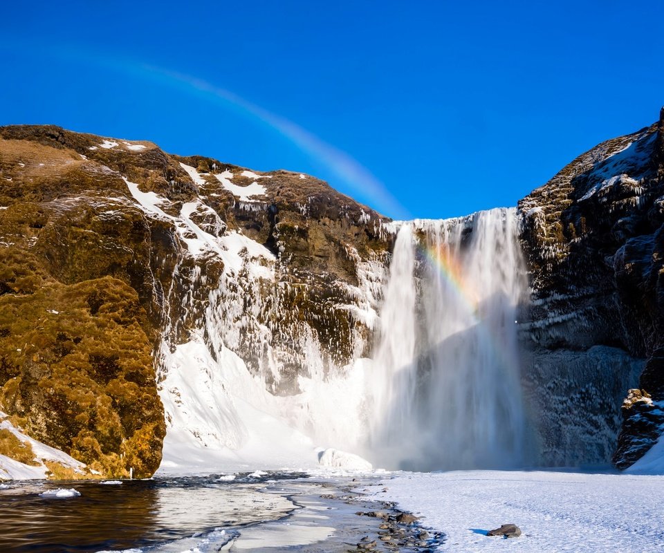 Обои горы, скалы, снег, зима, водопад, радуга, mountains, rocks, snow, winter, waterfall, rainbow разрешение 1920x1229 Загрузить