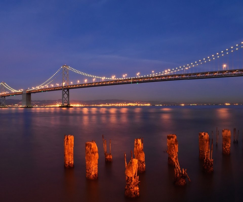 Обои ночь, огни, вода, панорама, мост, сан-франциско, bay bridge, бэй бридж, night, lights, water, panorama, bridge, san francisco разрешение 1920x1200 Загрузить