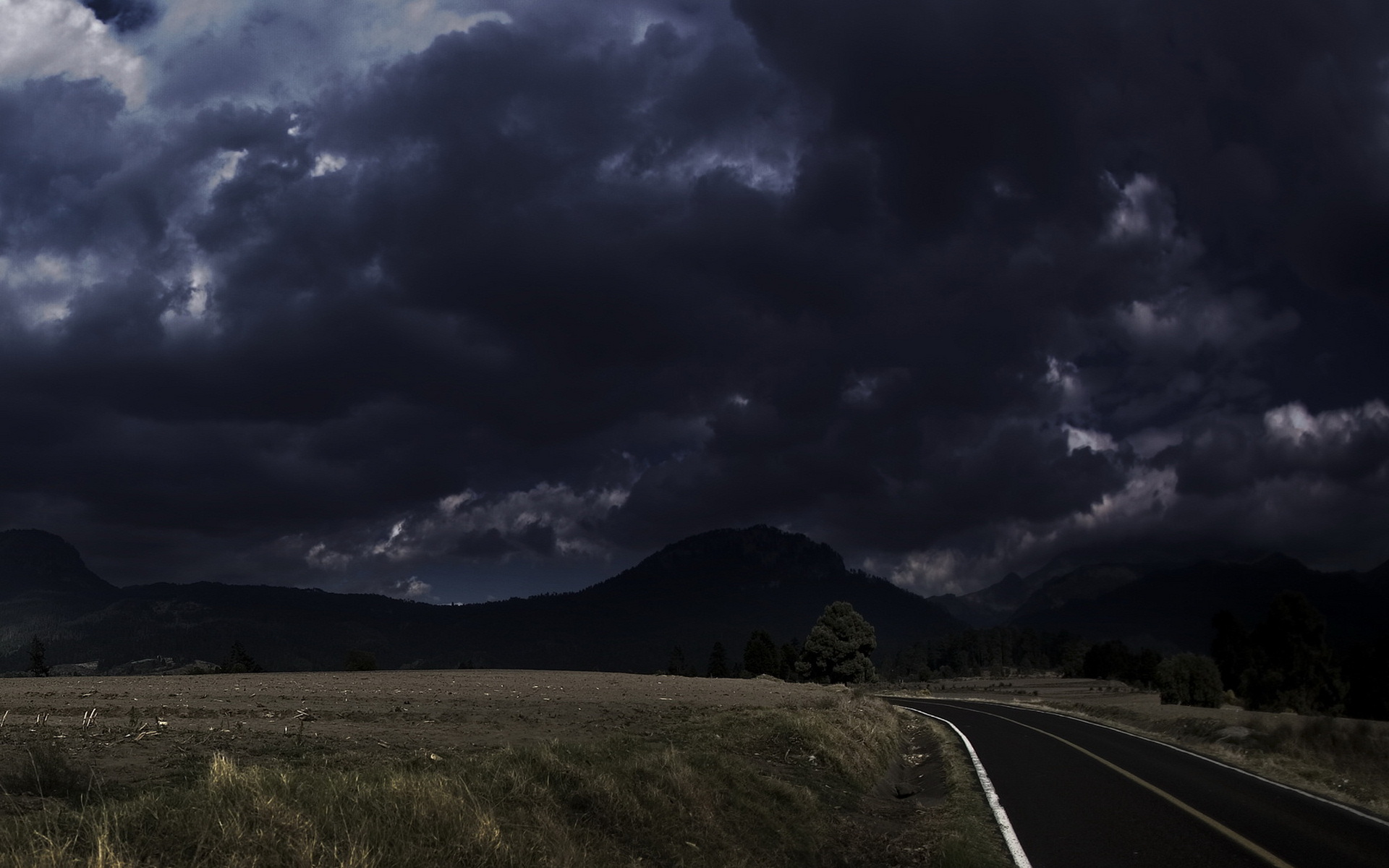 Обои дорога, облака, поле, грусть, тьма, road, clouds, field, sadness, darkness разрешение 1920x1200 Загрузить