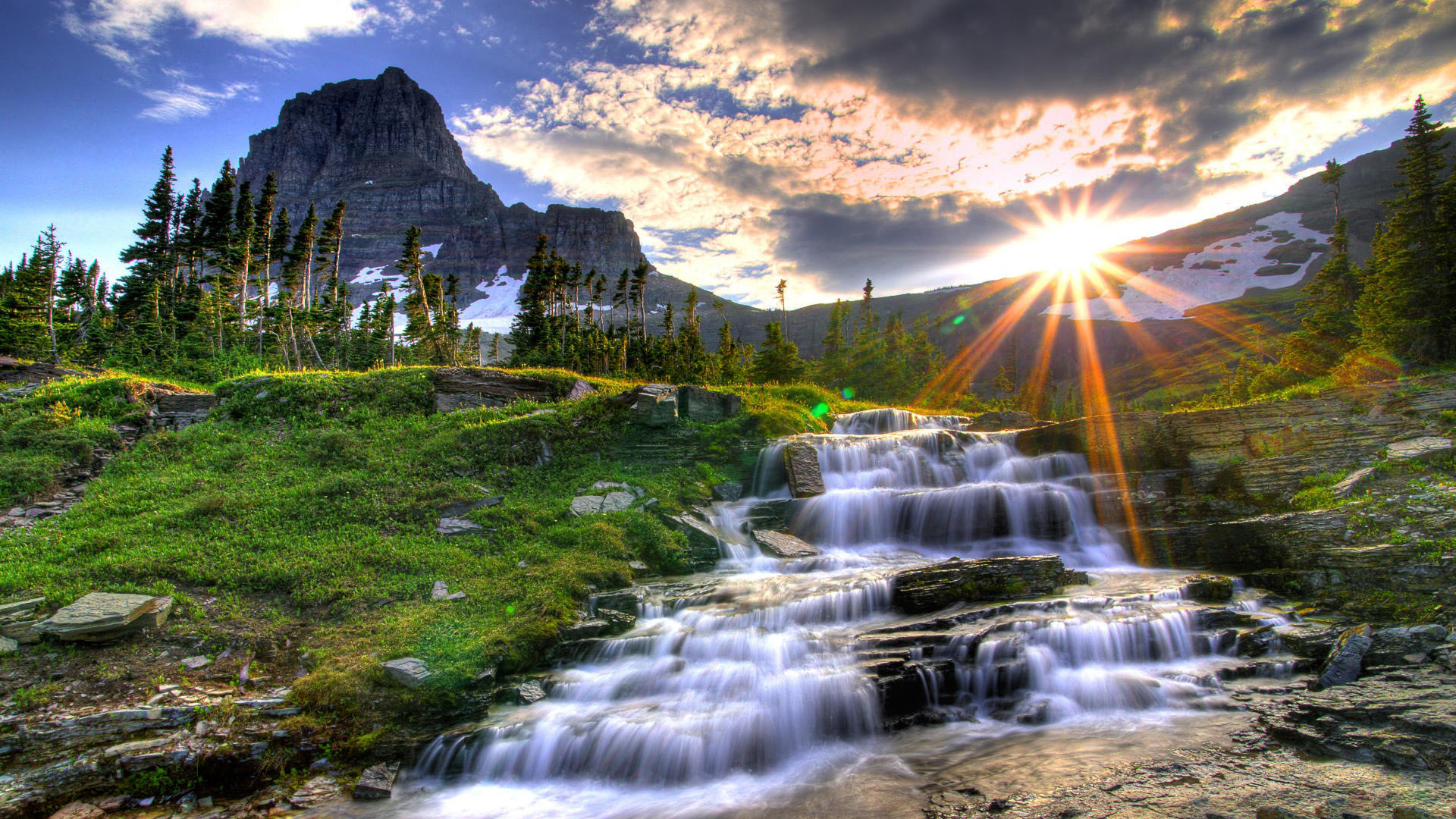 Обои небо, облака, снег, гора, водопад, солнечные лучи, вершина, the sky, clouds, snow, mountain, waterfall, the sun's rays, top разрешение 1920x1080 Загрузить