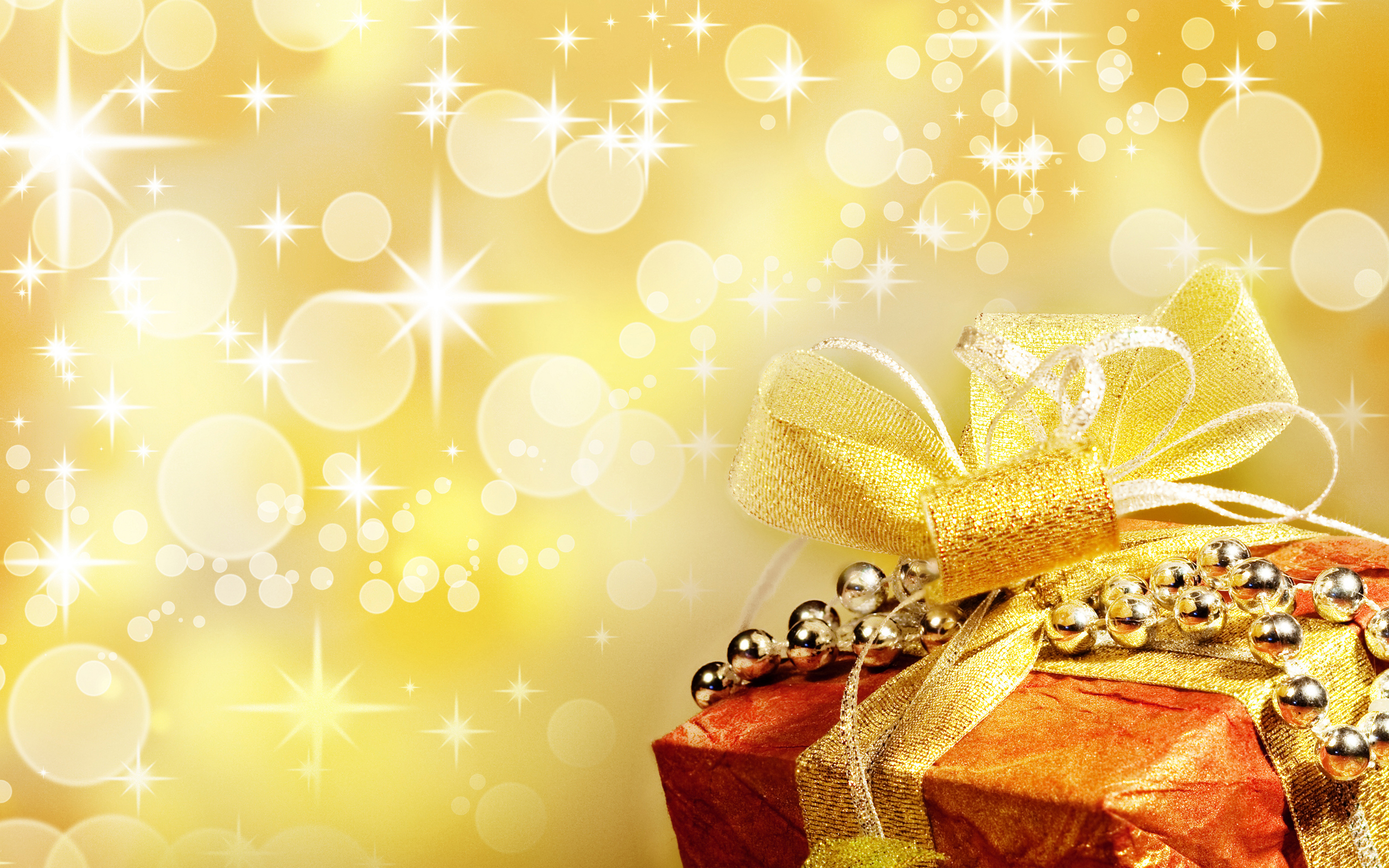 Обои новый год, зима, блики, подарок, ленточка, золотой, new year, winter, glare, gift, ribbon, gold разрешение 2560x1600 Загрузить