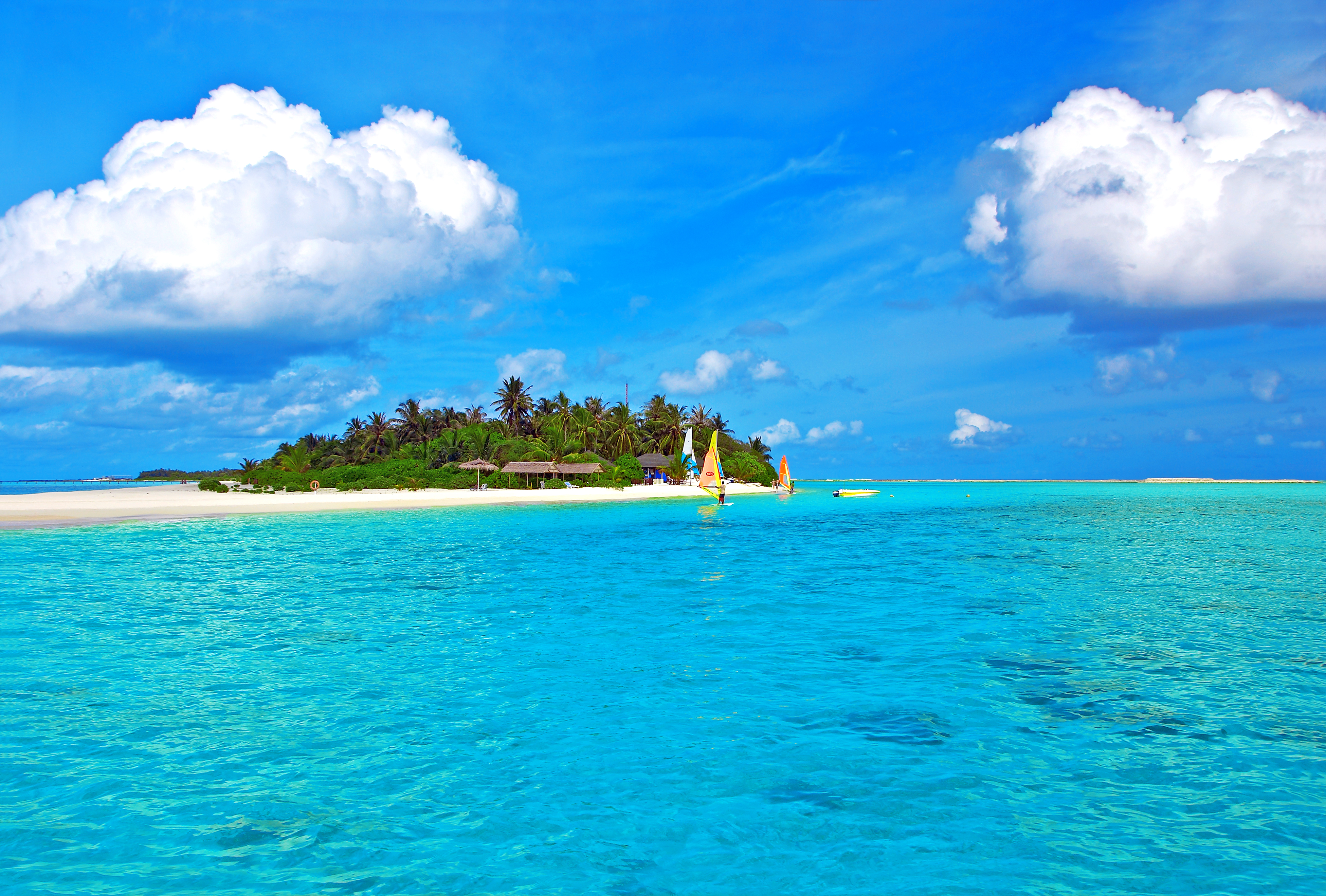 Про море остров. Карибское море Мальдивы. Мальдивы тропики. Мальдивы океан. Остров в океане.