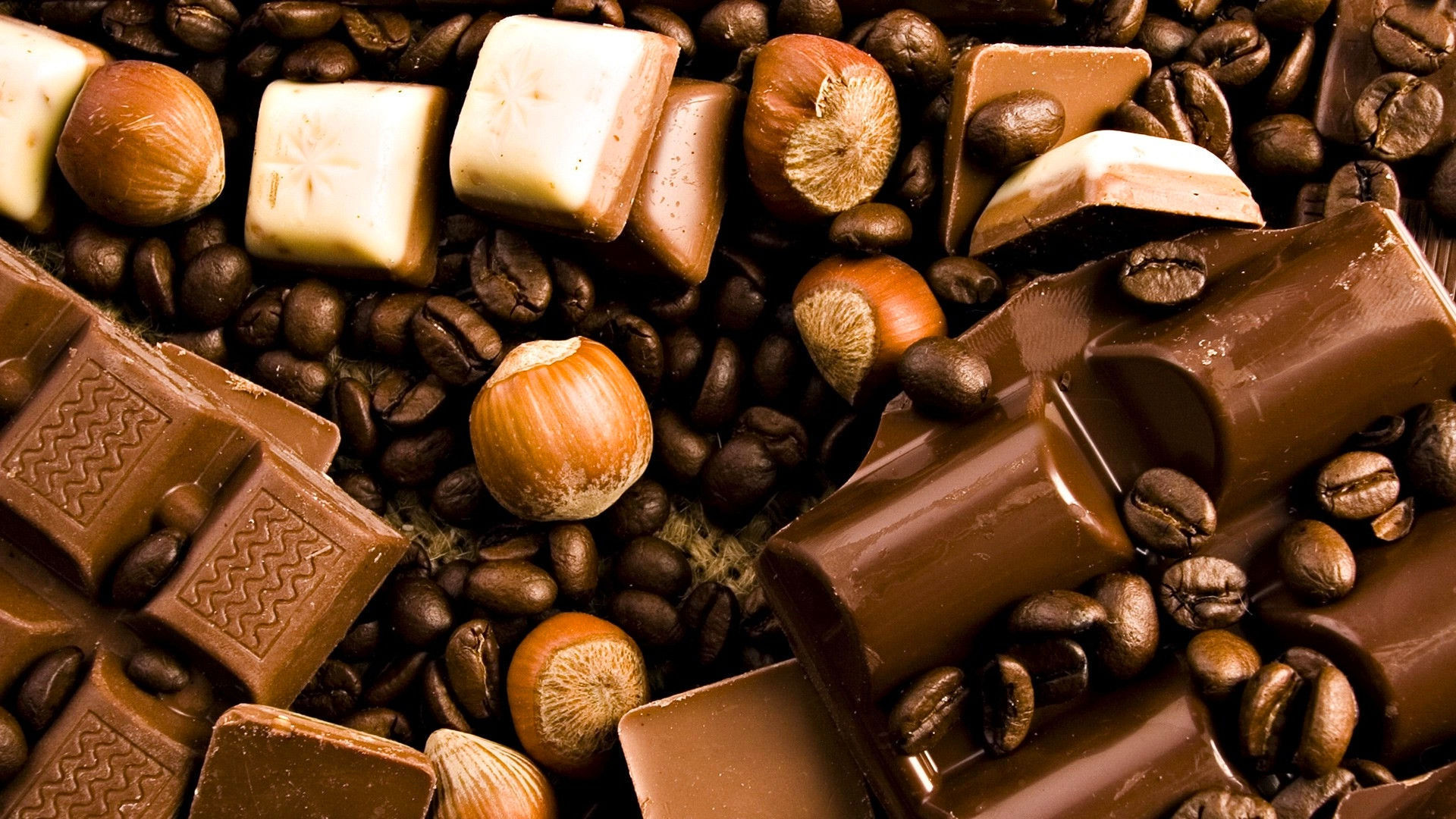 Лучший шоколад качество. Шоколадные конфеты. Шоколадный фон. Шоколад фон. Кофе и шоколад.