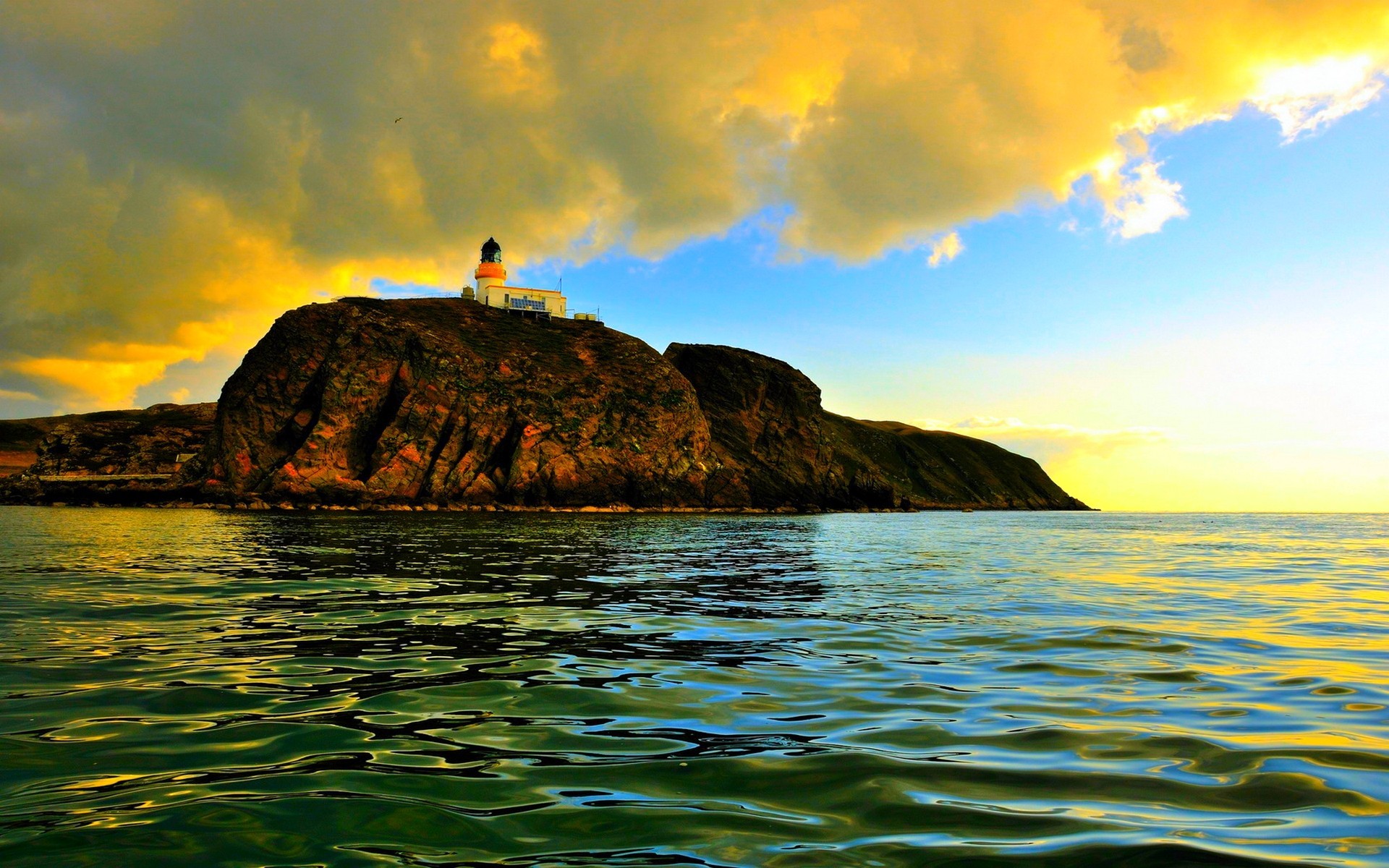 Обои небо, облака, скалы, пейзаж, море, маяк, the sky, clouds, rocks, landscape, sea, lighthouse разрешение 1920x1200 Загрузить